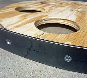 how to make warehouse cart wheels no special tools or materials needed, diy, how to, Applying the steel strapping