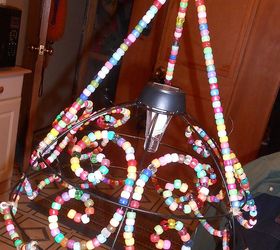 refurbished into solar lighting, go green, repurposing upcycling, A planter basket