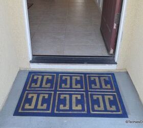 give a worn out rubber mat a new life with spray paint and stencil, crafts