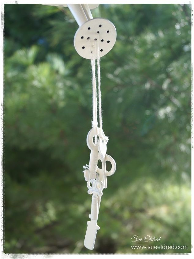How To Make An Up Cycled Watering Can Wind Chime Hometalk How To Make An Up Cycled Watering Can Wind Chime Crafts Home Decor