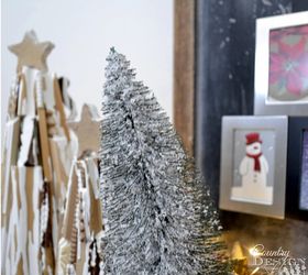 boxes of christmas decor turns mantel into a forest of trees, christmas decorations, fireplaces mantels, seasonal holiday decor
