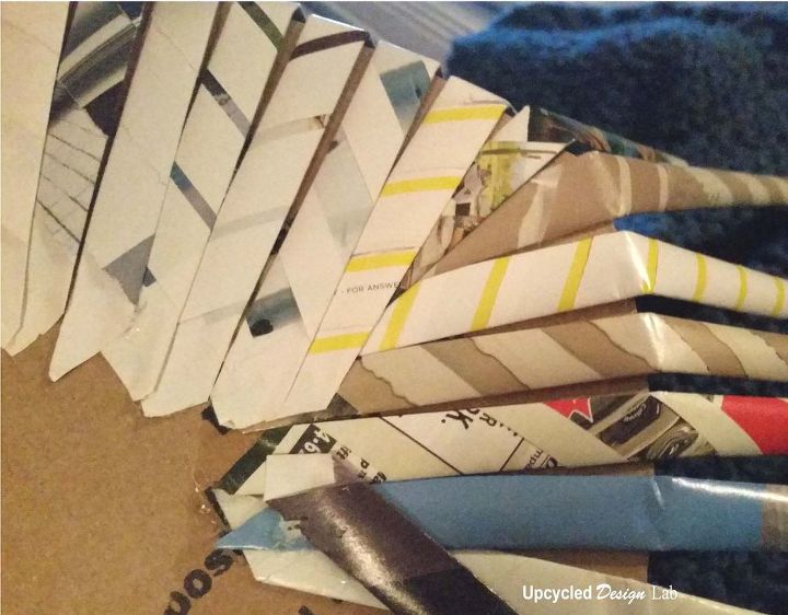 a trash can made from trash, crafts, repurposing upcycling