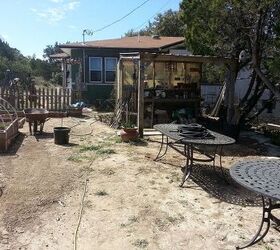 my first spring garden rennovating the landscape, flowers, gardening, pallet, raw area under construction garden beds to the left pond construction on the right I think this will eventually have an outdoor kitchen and entertaining area