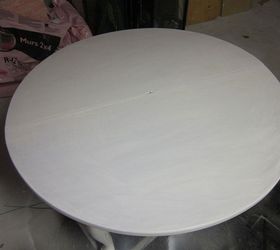 round table upcycled to a wall clock, repurposing upcycling, woodworking projects, I chiseled out the space for the clock The wood was so hard that even the hole cutter didn t roch it I used an old screwdriver and a hammer Then I primed the table