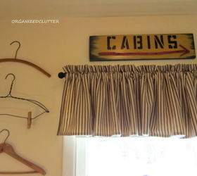 decorating a small bathroom, bathroom ideas, home decor, small bathroom ideas, A black ticking valance and vintage signs