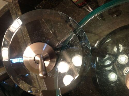How do I remove water stains from glass sink