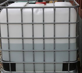 creating a simple and inexpensive rain water collection system, curb appeal, go green, We quickly filled almost 150 gallons from a single rain last week the day after we hooked the totes back up