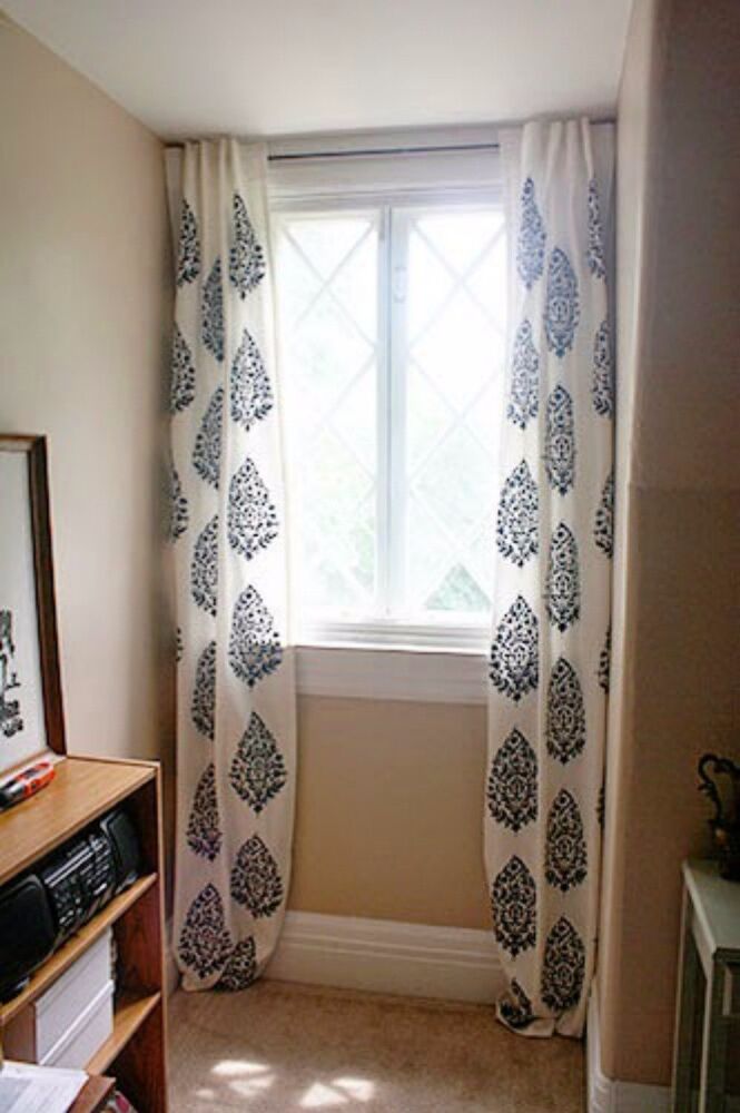 s decorate your living room for under 10 with these 15 ideas, Stencil a drop cloth for new curtains
