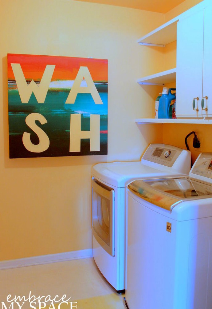 s 11 ways to update your dark and dingy laundry room for under 100, laundry rooms, Add some bright and colorful art