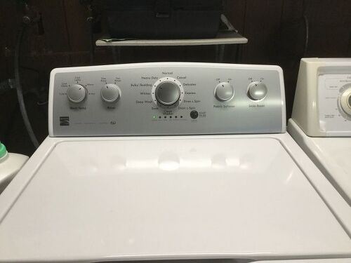 How do you clean a Kenmore washing machine?