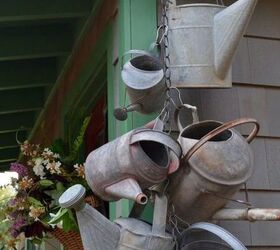 Hang a Collection of Watering Cans to Decorate a Garden Shed Hometalk