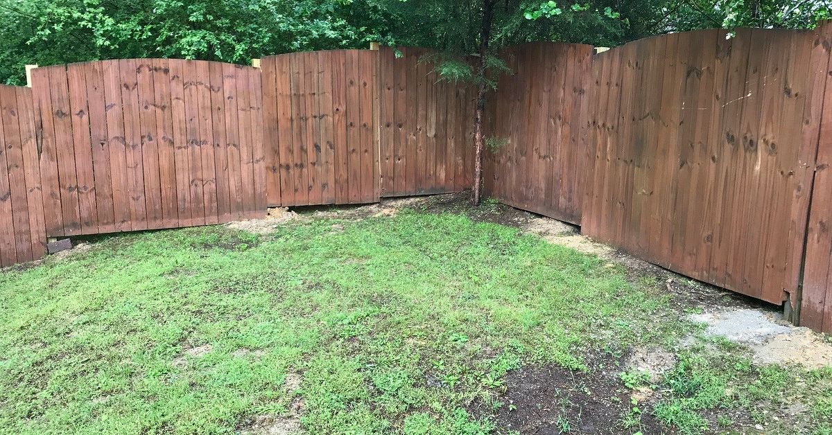 How to cover gaps at bottom of wood fence? | Hometalk