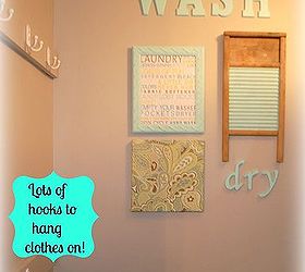 laundry room, cleaning tips, laundry rooms, shelving ideas, storage ideas, Lots of hooks for hanging clothes right out of the dryer Added fun artwork to brighten up the space