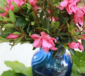 centerpiece with blue glass bottles, crafts, home decor, repurposing upcycling