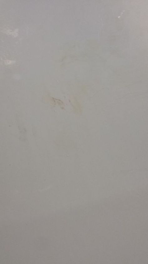 bleach stained red bathtub turned sparkling white again, bathroom ideas, cleaning tips