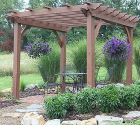 pergola season helpful tips to building your own, diy, outdoor living, woodworking projects, Hanging plants are a nice touch