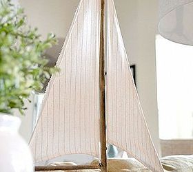 a simple vignette, home decor, A cute ship from Home Goods takes center stage