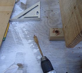i repurposed shelf brackets from a chair they now hold the shelf that holds the tv, diy, repurposing upcycling, shelving ideas, woodworking projects, counter sinking for lagbolts with a paddle bit