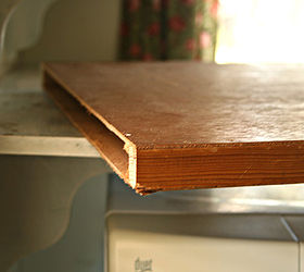 made my laundry room look better just using old wood and burlap, home decor, laundry rooms, A free hollow core door serves as the top so easy