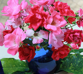 centerpiece with blue glass bottles, crafts, home decor, repurposing upcycling