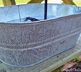 topsy turvy galvanized bucket planter, crafts, gardening, New galvanized buckets can be aged by spraying them with bleach