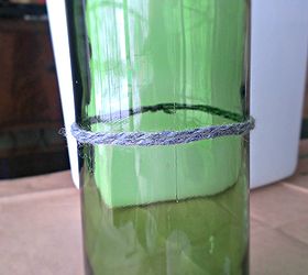 how to cut a glass bottle in half with yarn and fire, crafts, The acetone soaked yarn rapped around the bottle where it is to be cut