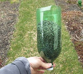 repurposed handy dandy bird seed scooper duper, gardening, repurposing upcycling, Some might think it s just a pop bottle but we know better