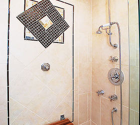 this warm eclectic contemporary master bath is not only easy on the eyes but easy, bathroom ideas, home decor, The interior of the shower with Teak shower bench down