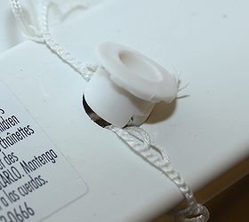 how to shorten faux wood blinds, home maintenance repairs, how to, window treatments, windows, Tie the excess ladder strings together and stuff them in the hole Replace the plug