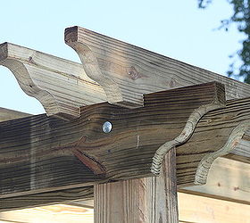 pergola season helpful tips to building your own, diy, outdoor living, woodworking projects, Double beams and double notches make it strong and secure here we are getting ready to drill through the second bolt