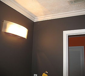 from playful kid s bathroom to sophisticated adult teen bathroom on a budget not, bathroom ideas, diy, home decor, AFTER New paint new light before the mirror went up