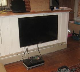 i repurposed shelf brackets from a chair they now hold the shelf that holds the tv, diy, repurposing upcycling, shelving ideas, woodworking projects, low hung living room TV 16 from the floor