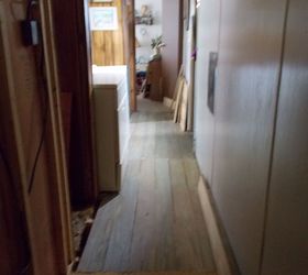 my own boardwalk, flooring, at this end the wall to the left is coming down