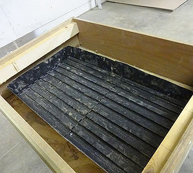 old drawers turned into planter boxes, container gardening, gardening, repurposing upcycling, I lined the drawer with a plastic tray and attached it to the bottom of the drawer to catch any run off from watering the plants I did have to cut it to make it fit but then just sealed it with a silicone bead so it wouldn t leak