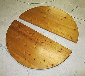 round table upcycled to a wall clock, repurposing upcycling, woodworking projects, The table before It came in 2 pieces without legs I removed the hinges from the back that enabled the table top to be folded
