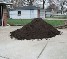 transforming my backyard into a secret garden, flowers, gardening, landscape, outdoor living, perennial, Thought that 5 yards of garden soil would be enough to cover the yard NOPE only covered half Had to order 5 more yards Mulch is on order for after the planting