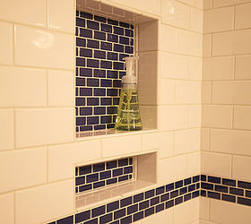 here is a hall bathroom that was in need of help the homeowner called in a panic, bathroom ideas, flooring, home improvement, plumbing, tile flooring, A cubby for soap and one for taller shampoo make for a nice touch and keeps the tub deck clean