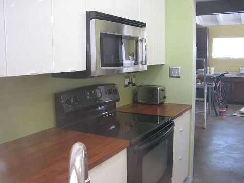 After relocating the gas stove we were able to install this microwave exhaust fan above the stove.
