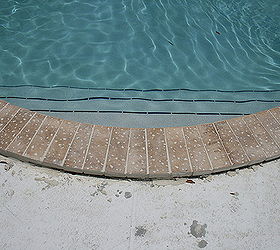 renovating a pool deck without removing old cracked concrete deck, concrete masonry, decks, outdoor living, pool designs, Before the reno coping was installed right on top of the existing coping You still can see the old concrete deck below it