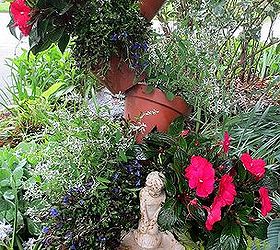 happy mother s day garden tour, gardening, Tipsy Pots planted with Euphorbia New Guinea Impatiens Lobelia and Creeping Jenny