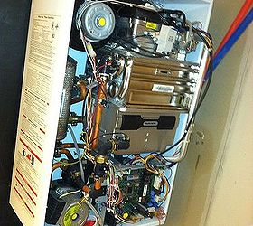 sediment in a hot water heater, home maintenance repairs, plumbing, This is the insides of a new tankless hot water heater