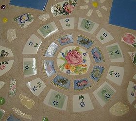 mosaic table for the patio or garden, outdoor furniture, painted furniture, tiling, close up of a plate area I am going to buy clear glass plates to put over this when I serve tea parties