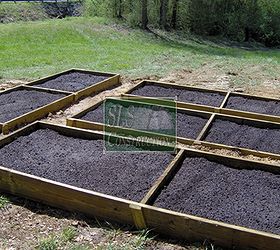 creating a raised garden bed in just a few hours, gardening, raised garden beds, The final shot with mulch added as reminder the object of a raised garden is not to hold water but rather to hold the soil which holds the water help keep weeds out If your garden dries out to quickly consider adding mulch on top