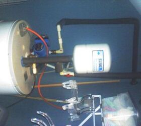 here are the picture of my house please leave any comments on how to make it look, home decor, I don t know how to cover up this water heater in my laundry room