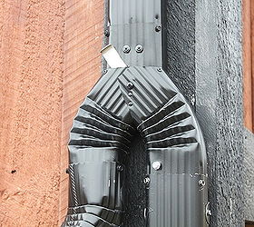 creating a simple and inexpensive rain water collection system, curb appeal, go green, Through a simple in line diverter the rainwater is carried to our main capture tank