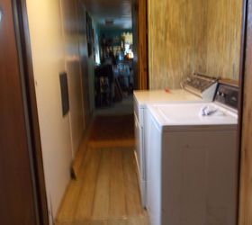 my own boardwalk, flooring, I primed and used the same stain behind the w d I will be painting a mural on the white wall on the left