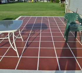how to paint patio tiles, concrete masonry, painting, patio, porches, This is what our patio looked like after we pulled off the tape It make a huge difference in this space
