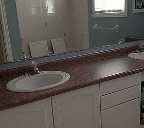 large bathroom mirror redo to double framed mirrors and cabinet, bathroom ideas, home decor, shelving ideas, also painted our cabinets in a trim and door paint