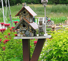 placing birdhouses in the garden, flowers, gardening, Home made posts can let you add even more character and color than traditional store bought designs
