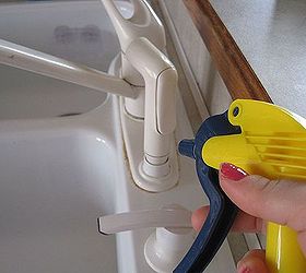 how to easily remove hard water deposits, home maintenance repairs, how to, Start by saturating the entire area with a 60 40 percent mixture of white vinegar and water Spray the area liberally with a spray bottle and let the mixture sit for a few minutes This will help loosen everything up